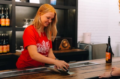 stamping passport on Gatlinburg Wine Trail