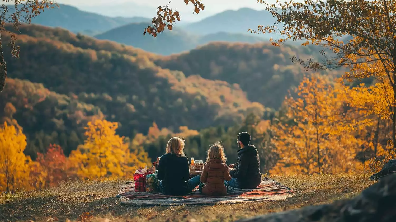 A family on a picnic in the Smoky Mountains in the Fall.